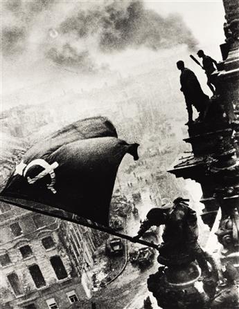 YEVGENY KHALDEI (1917-1997) A pair of photographs depicting Soviet soldiers raising the Communist Red Flag over the Reichstag in Berlin